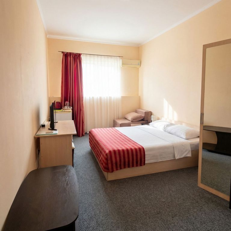 Максимус — Двухместный номер с 2 отдельными кроватями эконом