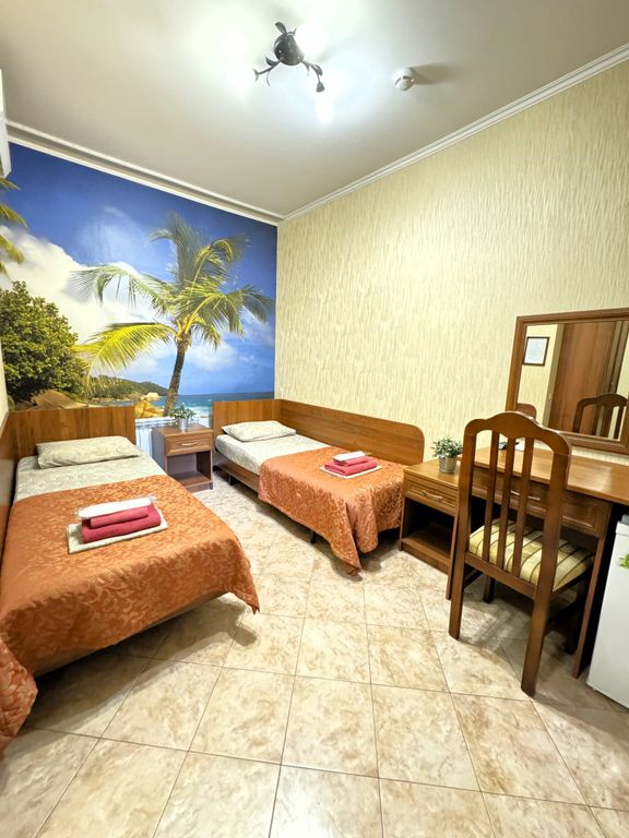 Атриум — Двухместный номер с 2 отдельными кроватями (окно выходит в атриум отеля)