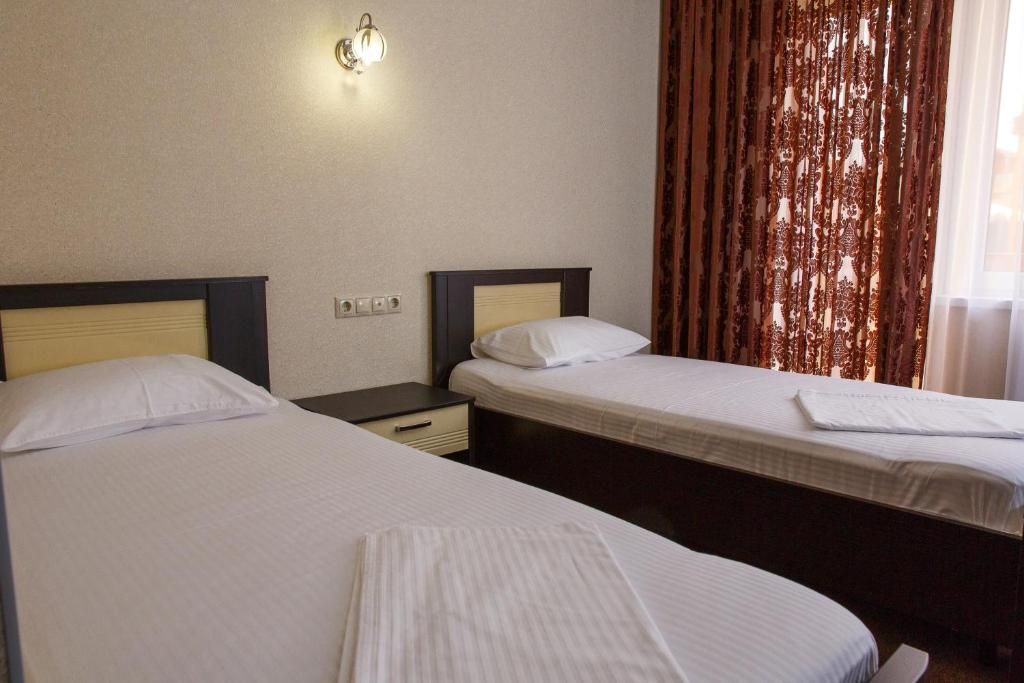 Золотой берег — Двухместный номер с 2 отдельными кроватями стандарт