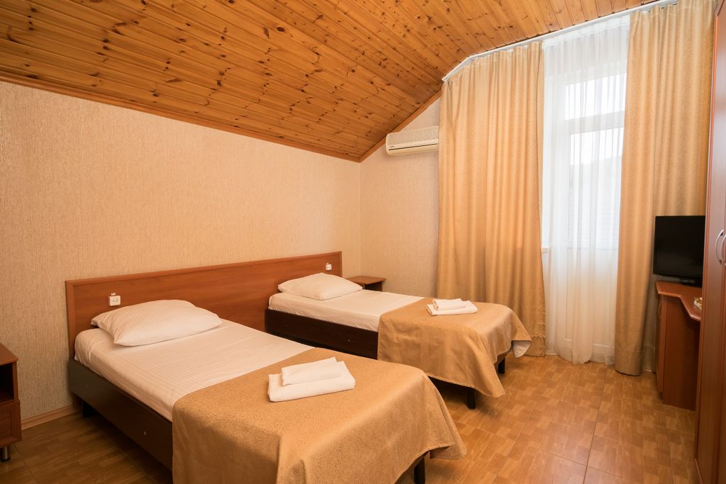 Экодом Фэмили — Двухместный номер с 2 отдельными кроватями эконом