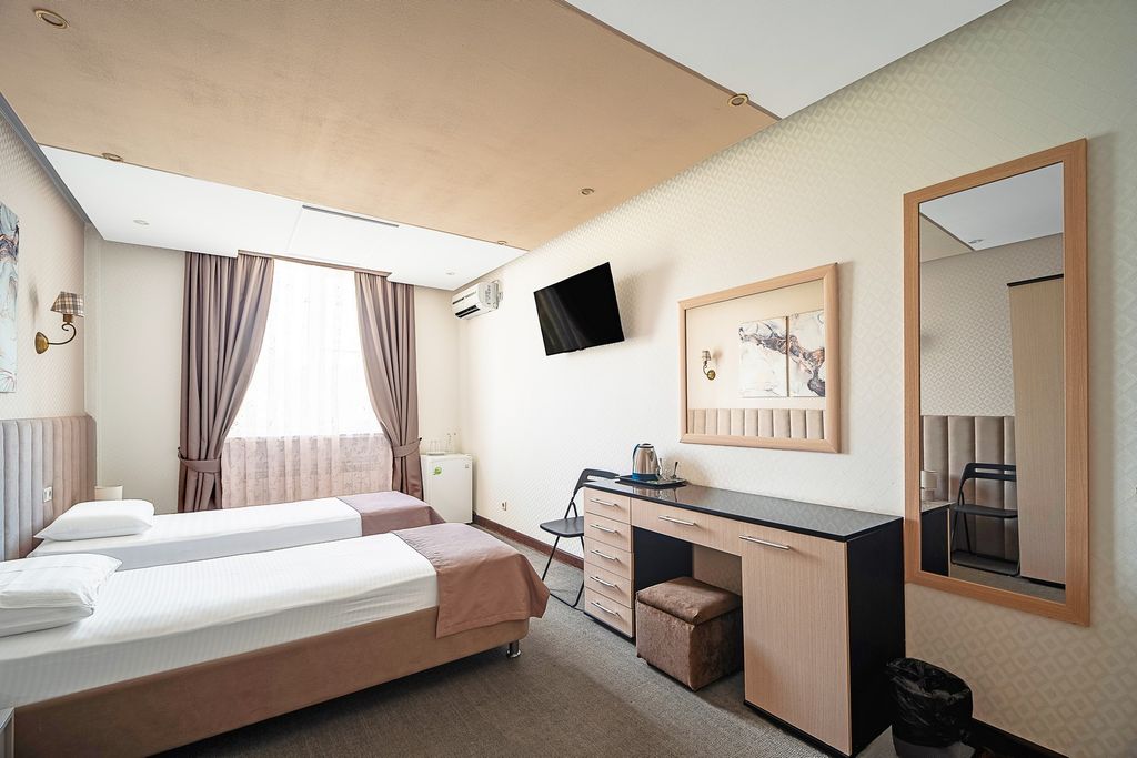 Альянс — Двухместный номер с 2 отдельными кроватями Стандарт