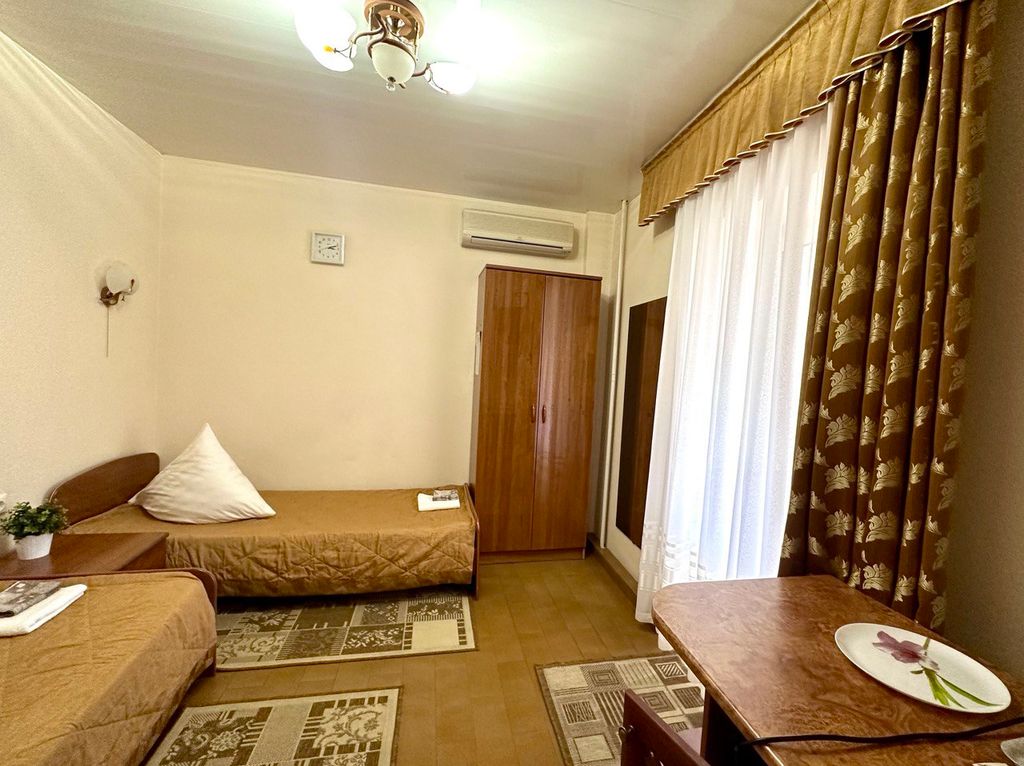 Магнолия — Двухместный номер с 2 отдельными кроватями улучшенный