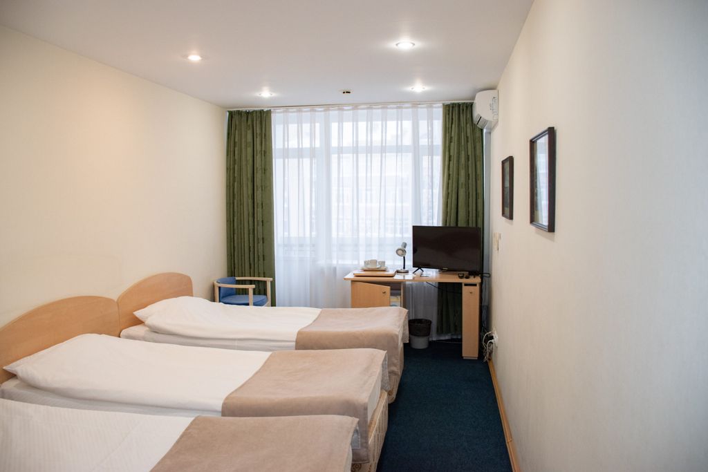 Президент ДИС — Двухместный номер с 2 отдельными кроватями с дополнительным местом