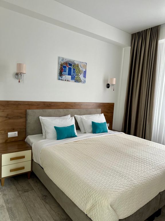 Santorini Family Club — Четырёхместный номер Двухкомнатный номер 40 кв.м. - Люкс white-coffee с персональным двориком-патио на 45 кв.м с прямым видом на море