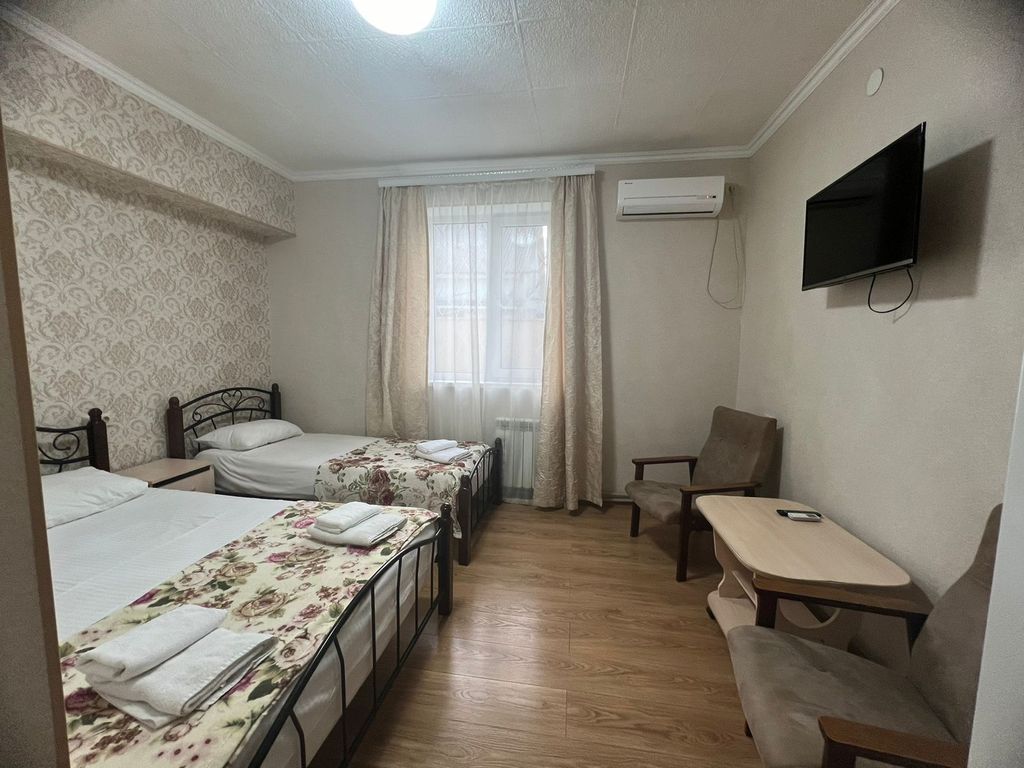 Сиена — Семейный номер улучшенный с видом на город