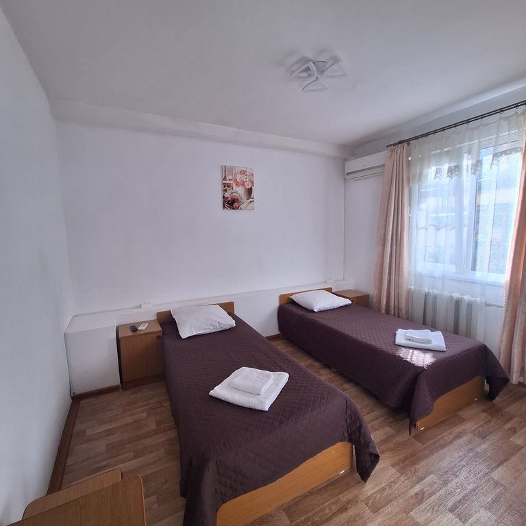 Арина — Двухместный номер с 2 отдельными кроватями стандарт