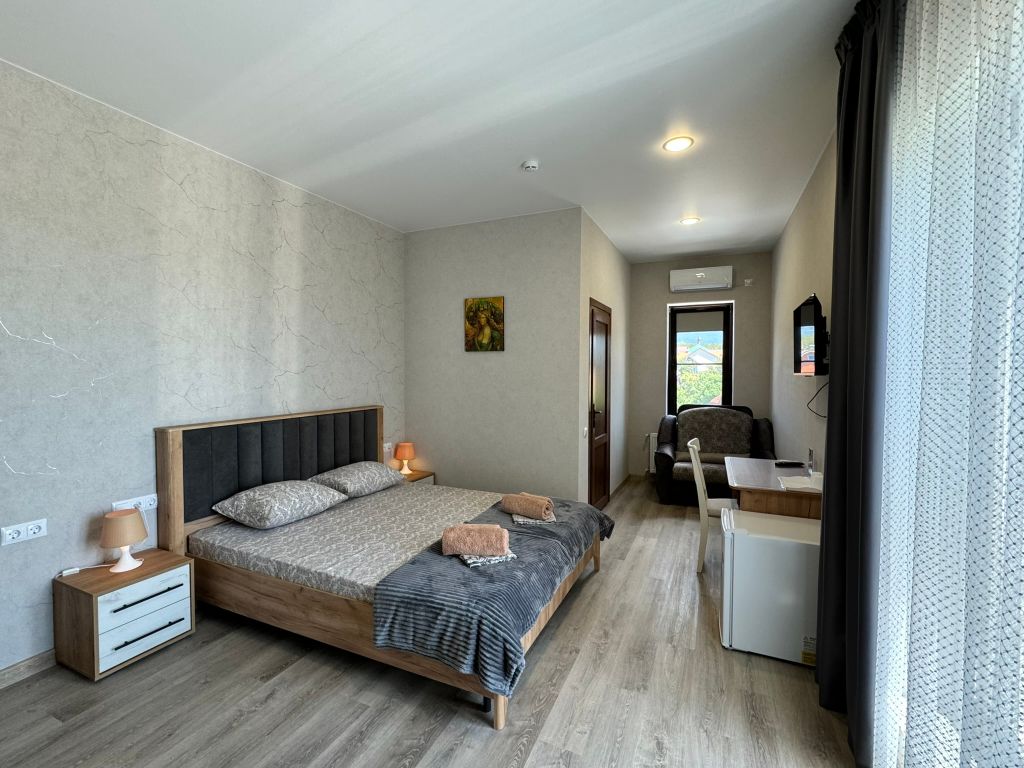 Капитан — Трёхместный номер люкс с видом на море