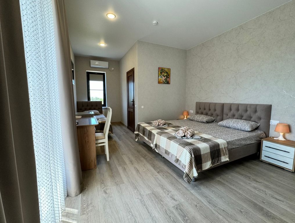 Капитан — Трёхместный номер люкс с видом на море