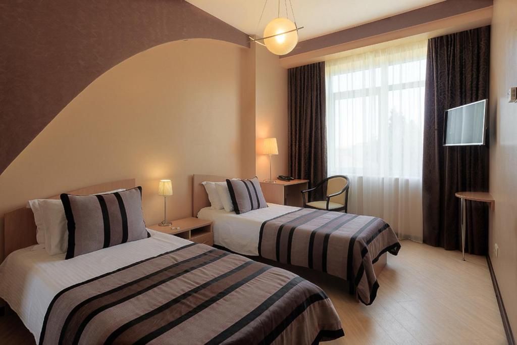 AC — Двухместный номер с 2 отдельными кроватями без балкона