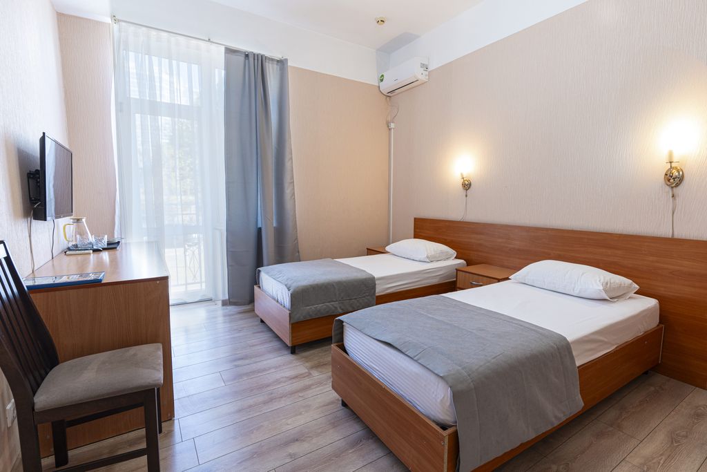 Атлантида — Двухместный номер с 2 отдельными кроватями стандарт с видом на город