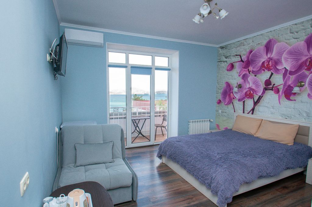 Килова гора — Трёхместный номер Делюкс с видом на море и креслом кроваатью