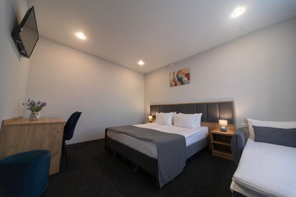 Орион — Семейный номер с одной двуспальной кроватью