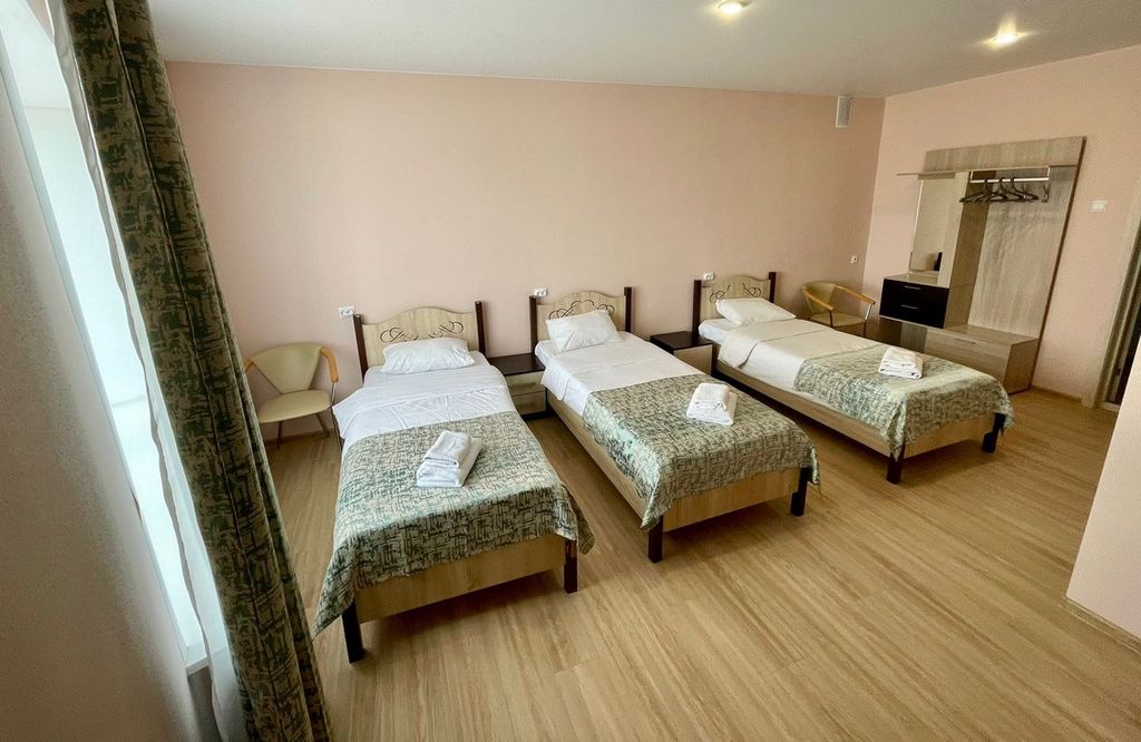 Норд — Трёхместный номер с тремя комфортными кроватями