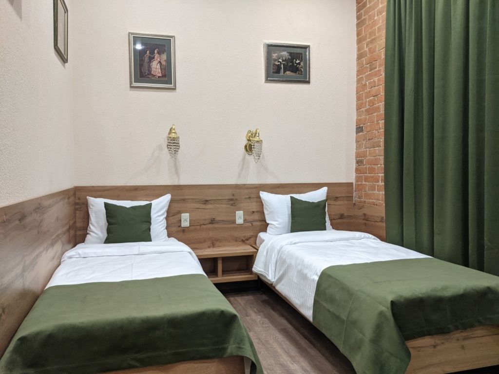 Галерея — Двухместный номер с 2 отдельными кроватями стандарт