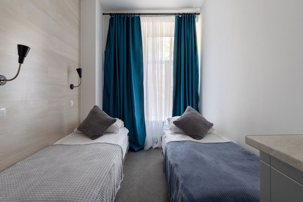 Трио — Двухместный номер с 2 отдельными кроватями стандарт с кухней