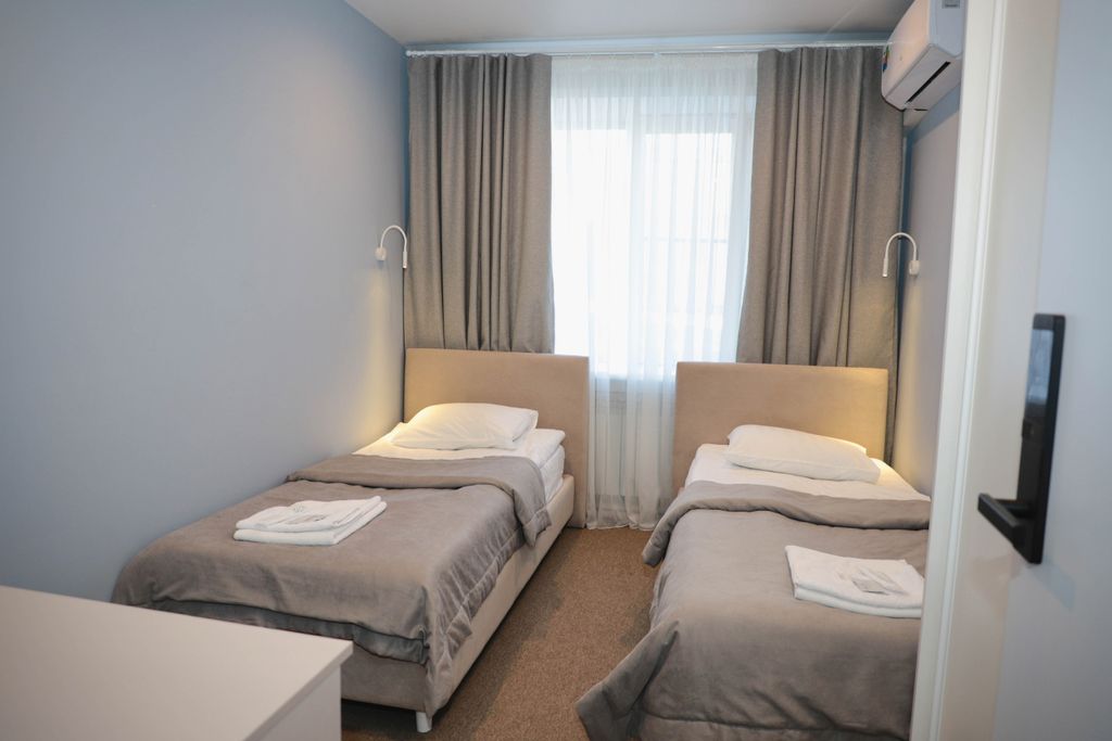 Сон — Двухместный номер с 2 отдельными кроватями эконом