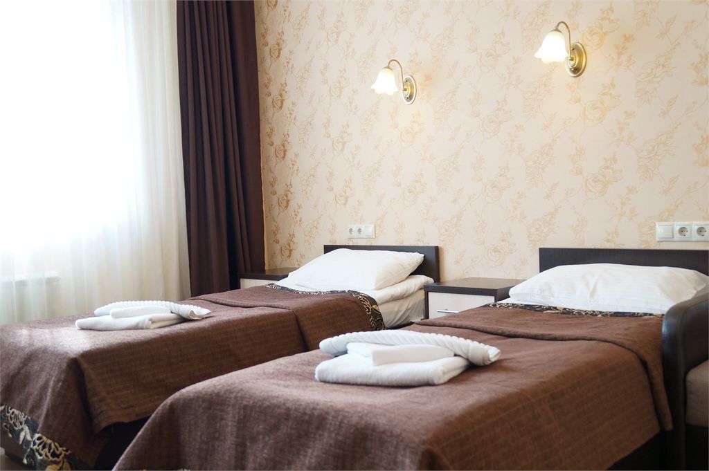 Олимпия — Двухместный номер с 2 отдельными кроватями стандарт