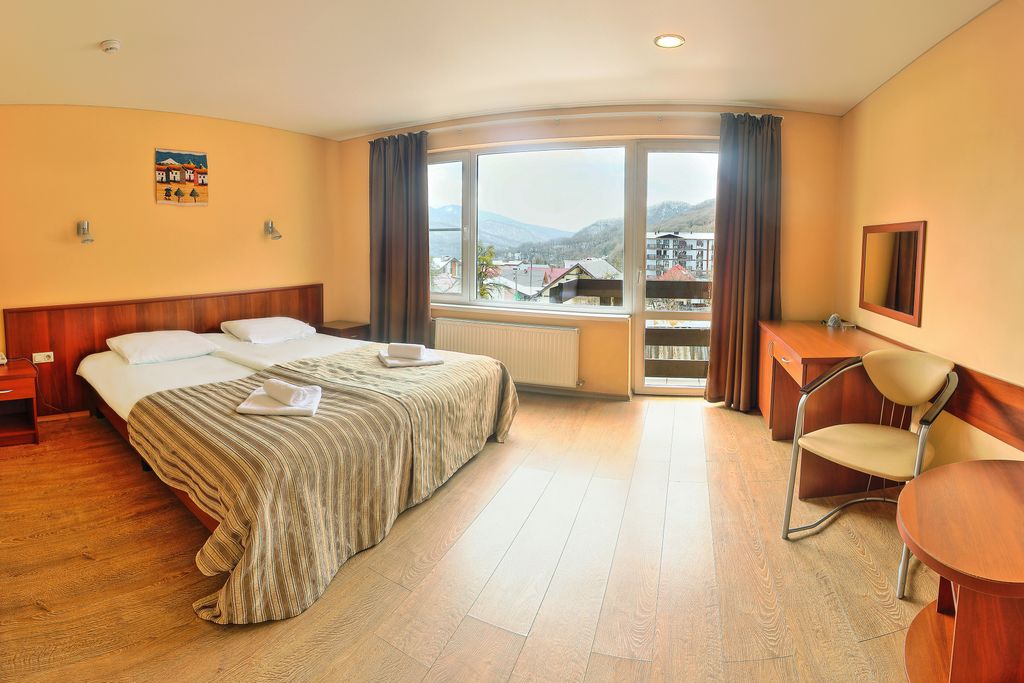 Тукан — Двухместный номер с 2 отдельными кроватями стандарт с балконом