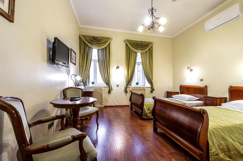 Времена Года — Двухместный номер с 2 отдельными кроватями улучшенный номер