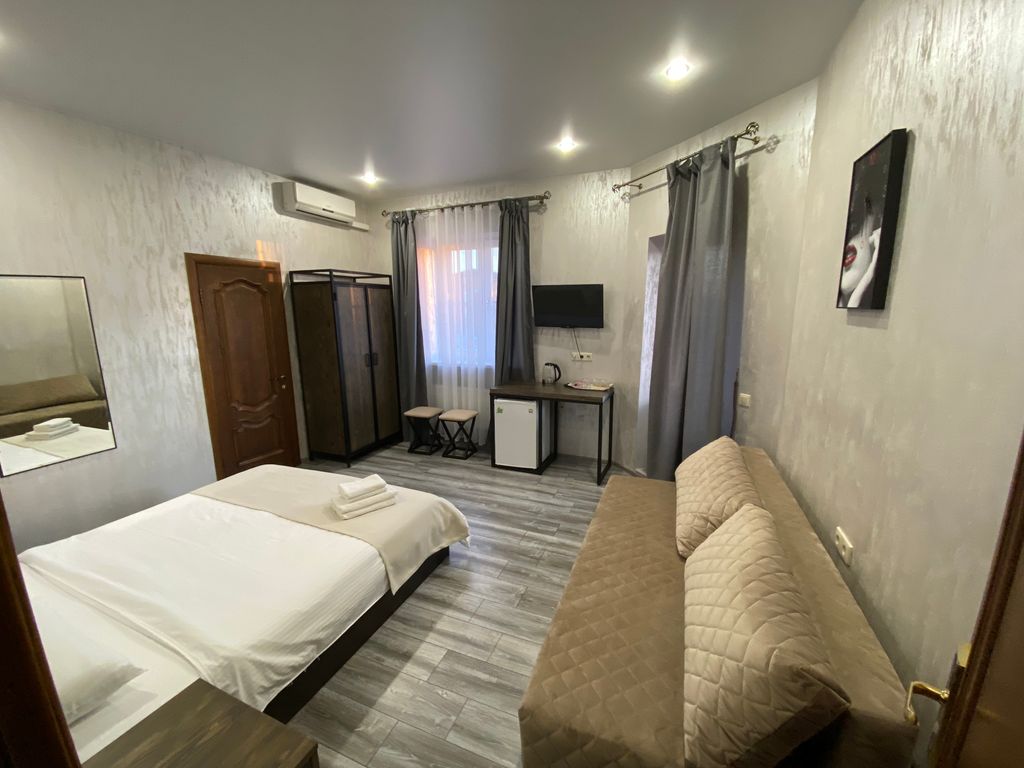 Дольче Вита — Четырёхместный номер улучшенный 303