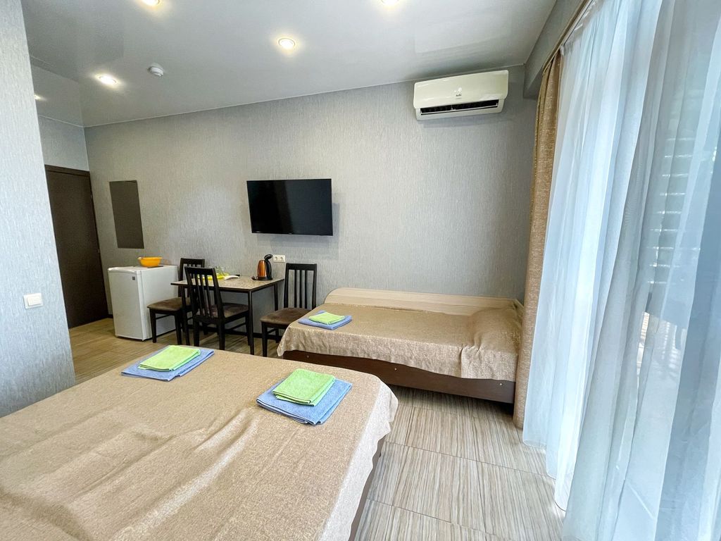 OstrovOk — Трёхместный номер стандарт с видом на город