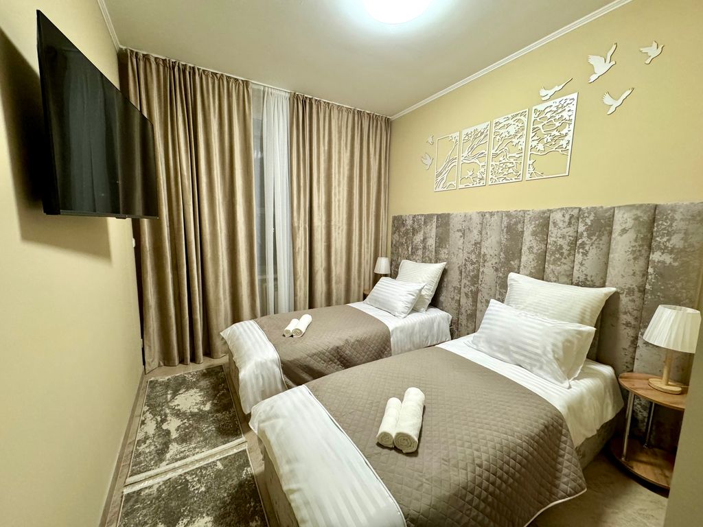 Марс — Двухместный номер с 2 отдельными кроватями улучшенный