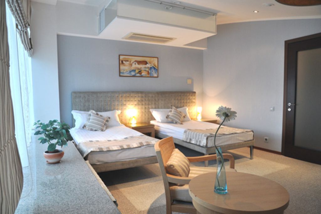 Персона — Двухместный номер с 2 отдельными кроватями Люкс