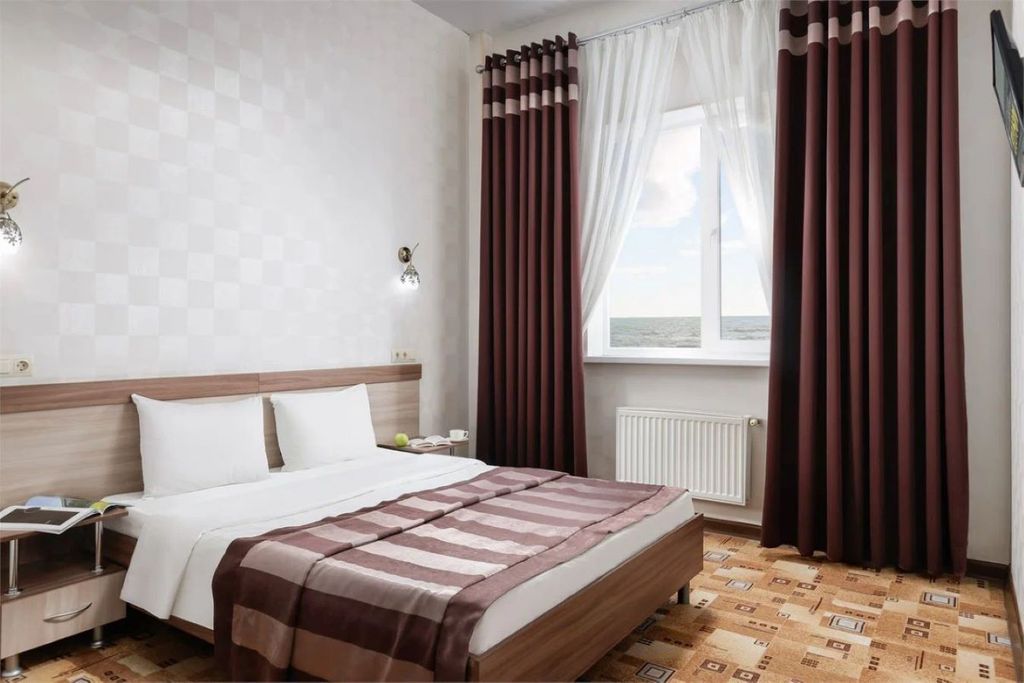 Фестиваль — Четырёхместный номер люкс с видом на море