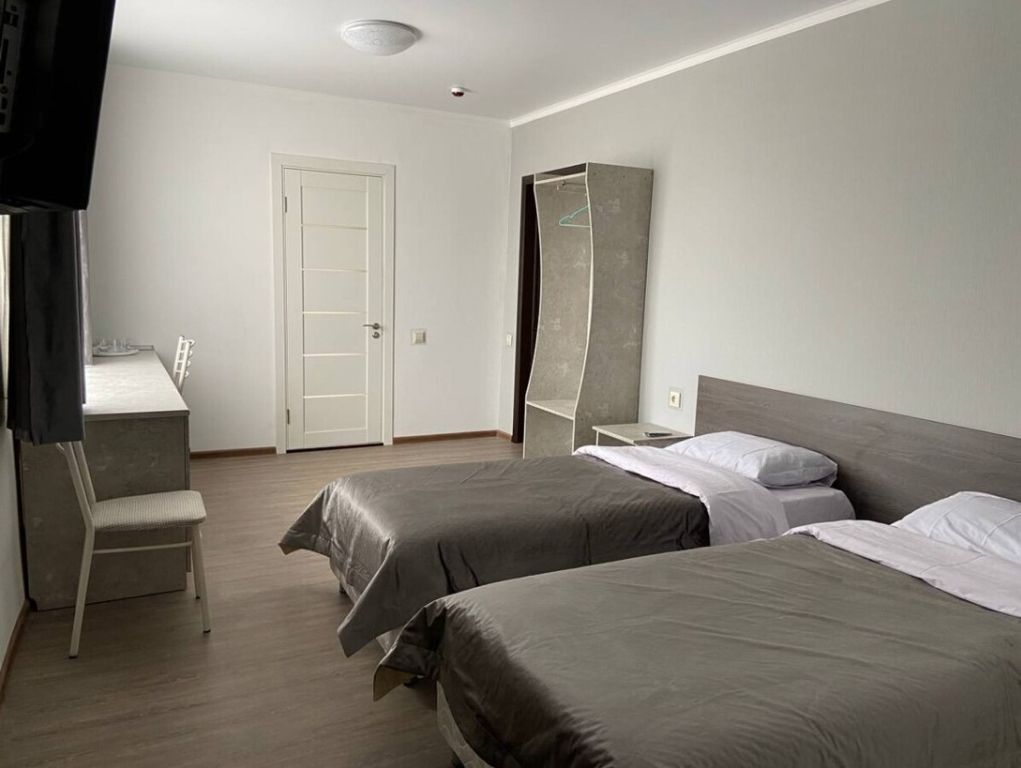 Атмосфера — Двухместный номер с 2 отдельными кроватями с возможностью соединения в двуспальную кровать