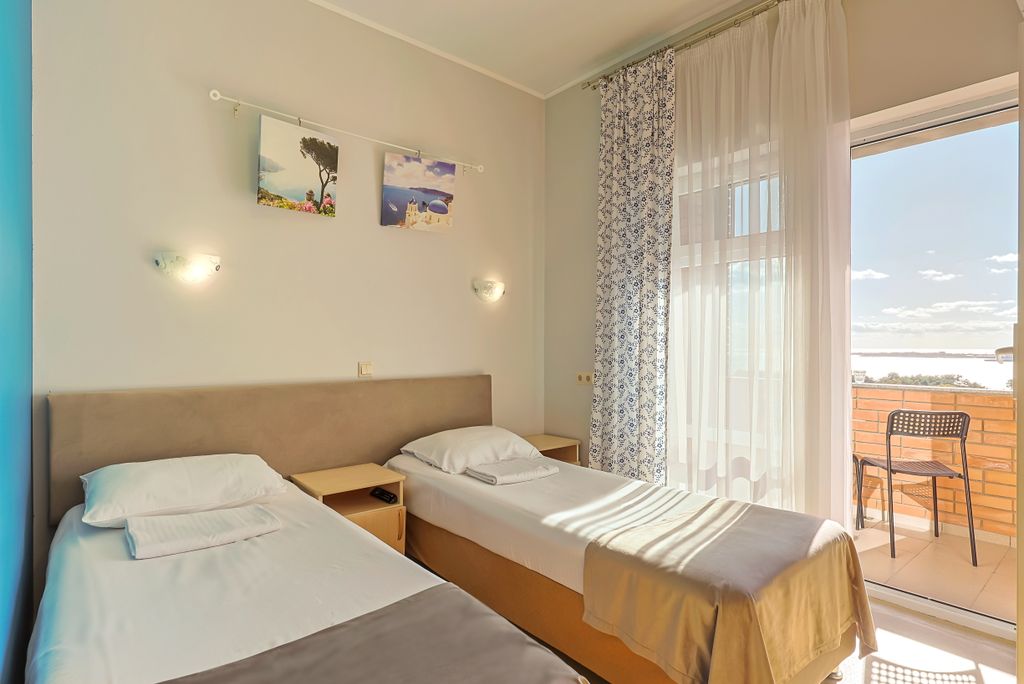 Дом Путешественника — Двухместный номер с 2 отдельными кроватями улучшенный с видом на море