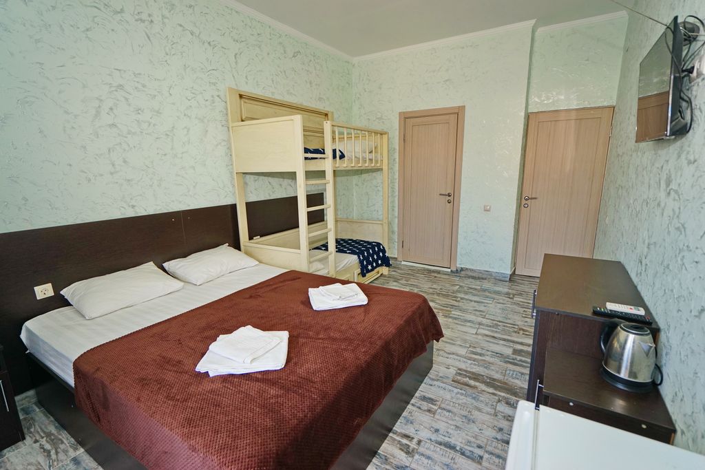 Grad — Четырёхместный номер с балконом