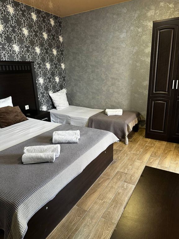 Сати — Трёхместный номер улучшенный с видом на горы