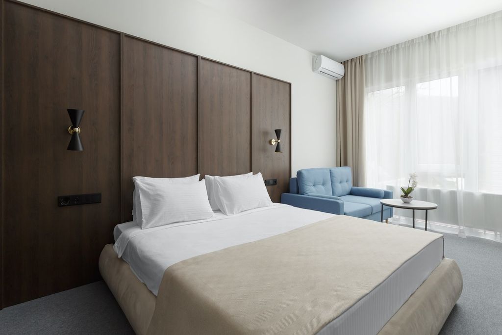 Эльпида Неолит — Четырёхместный номер делюкс с балконом