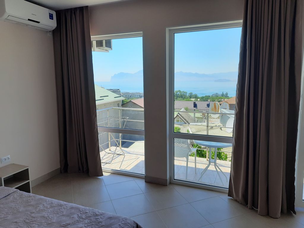 Paradise 2 — Четырёхместный номер люкс с видом на море