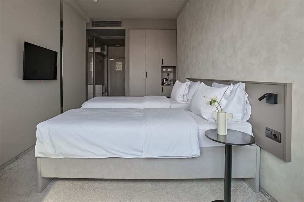 Slide — Двухместный номер с 2 отдельными кроватями Стандарт Плюс