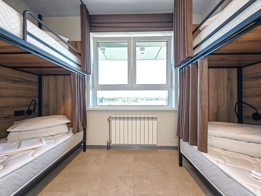 Хостел ДК — Многоместный женский номер Место в восьмиместном номере