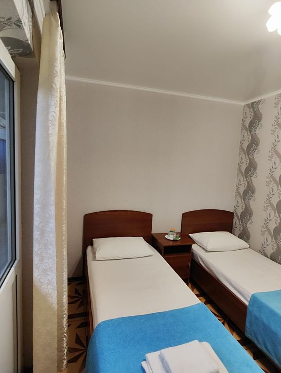 Дар — Двухместный номер с 2 отдельными кроватями эконом