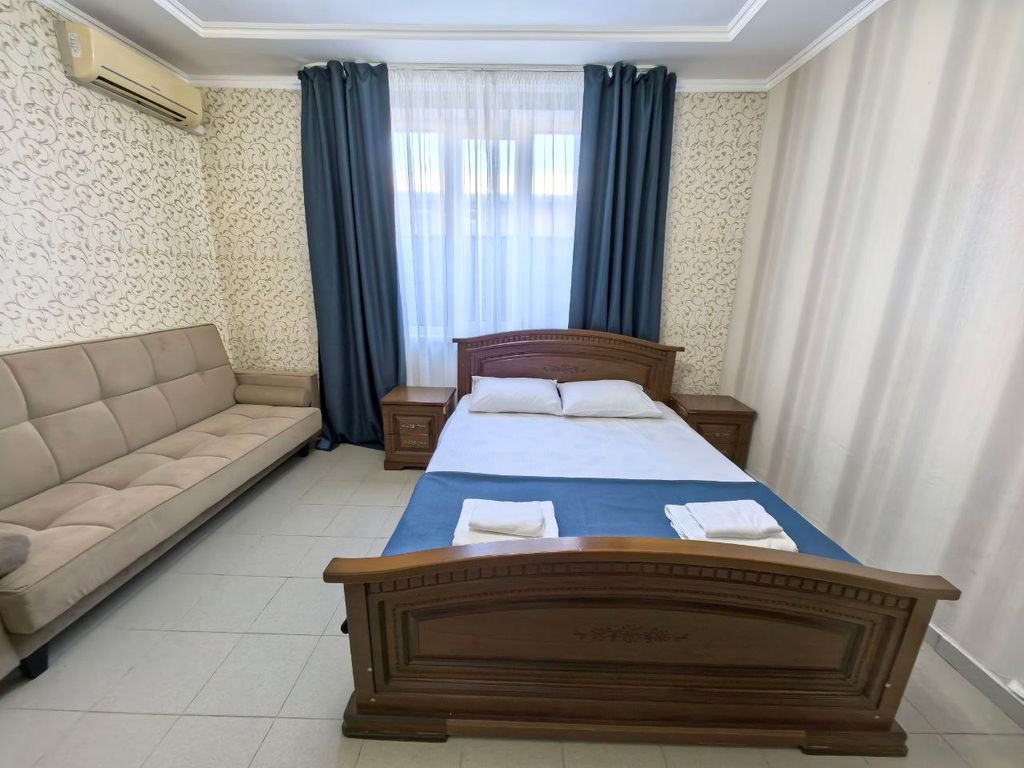 Qualite — Четырёхместный номер Делюкс