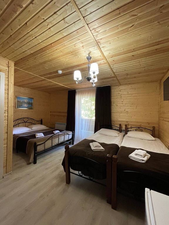 Golden Arkhyz — Четырёхместный номер люкс