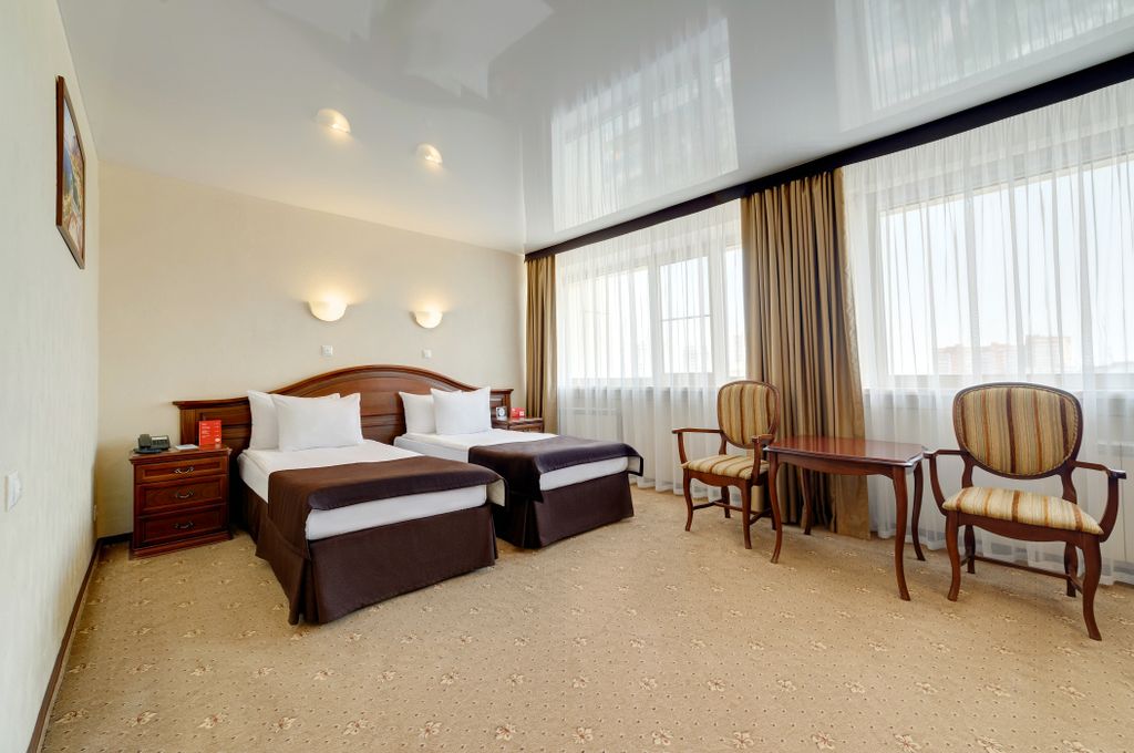 Южный — Двухместный номер с 2 отдельными кроватями Джуниор сюит твин