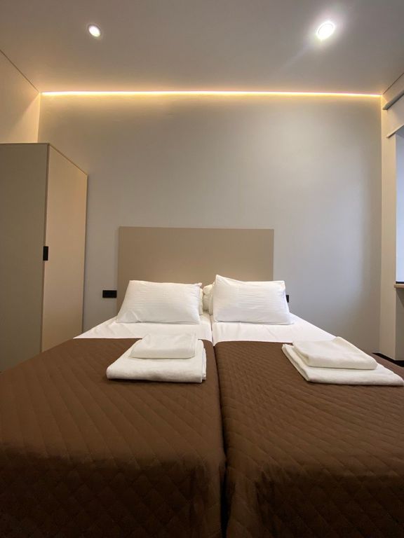 Логос — Двухместный номер с 2 отдельными кроватями комфорт +