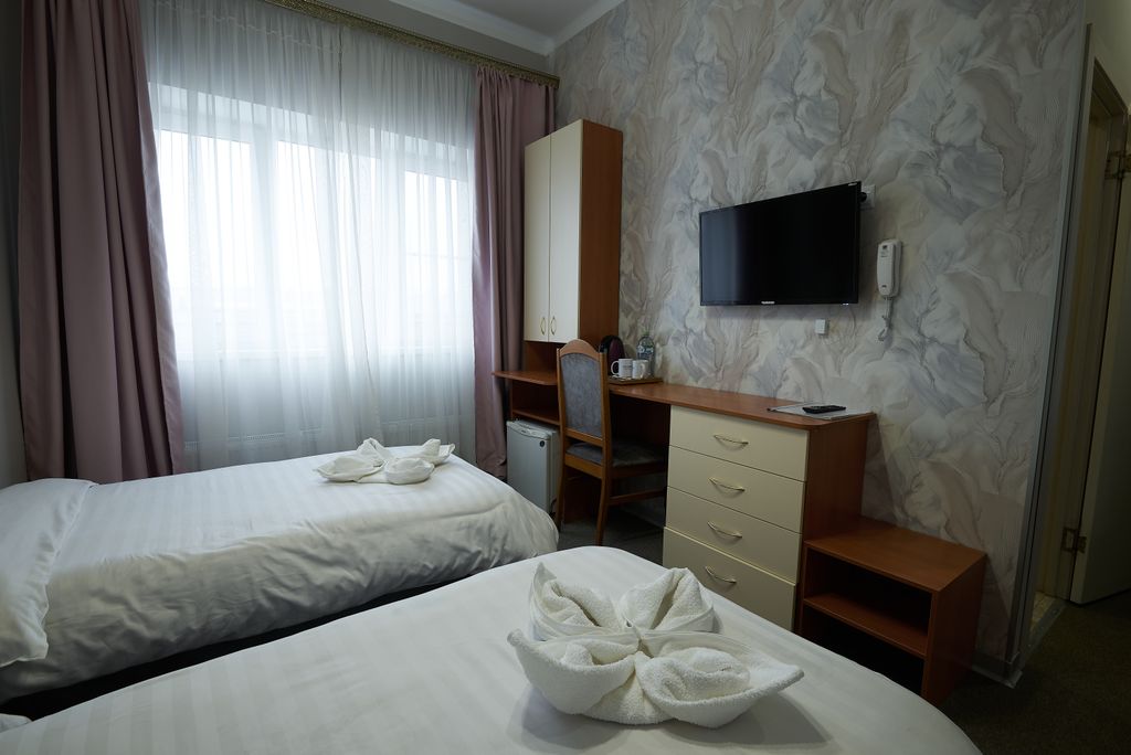 Гость — Двухместный номер с 2 отдельными кроватями Улучшенный Стандарт