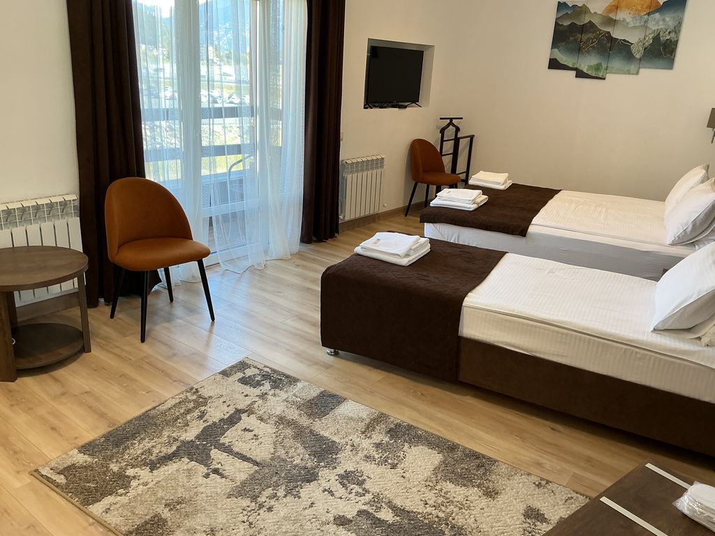 Астра — Трёхместный номер с кухонным уголком