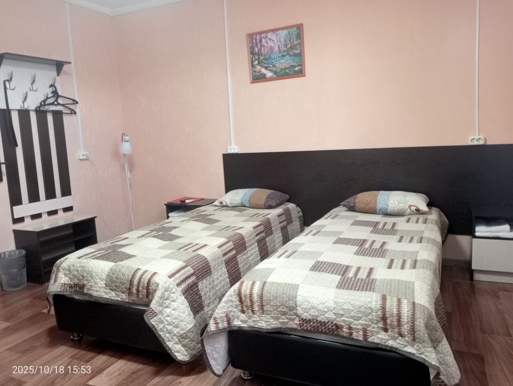 Альфа — Двухместный номер с 2 отдельными кроватями стандарт