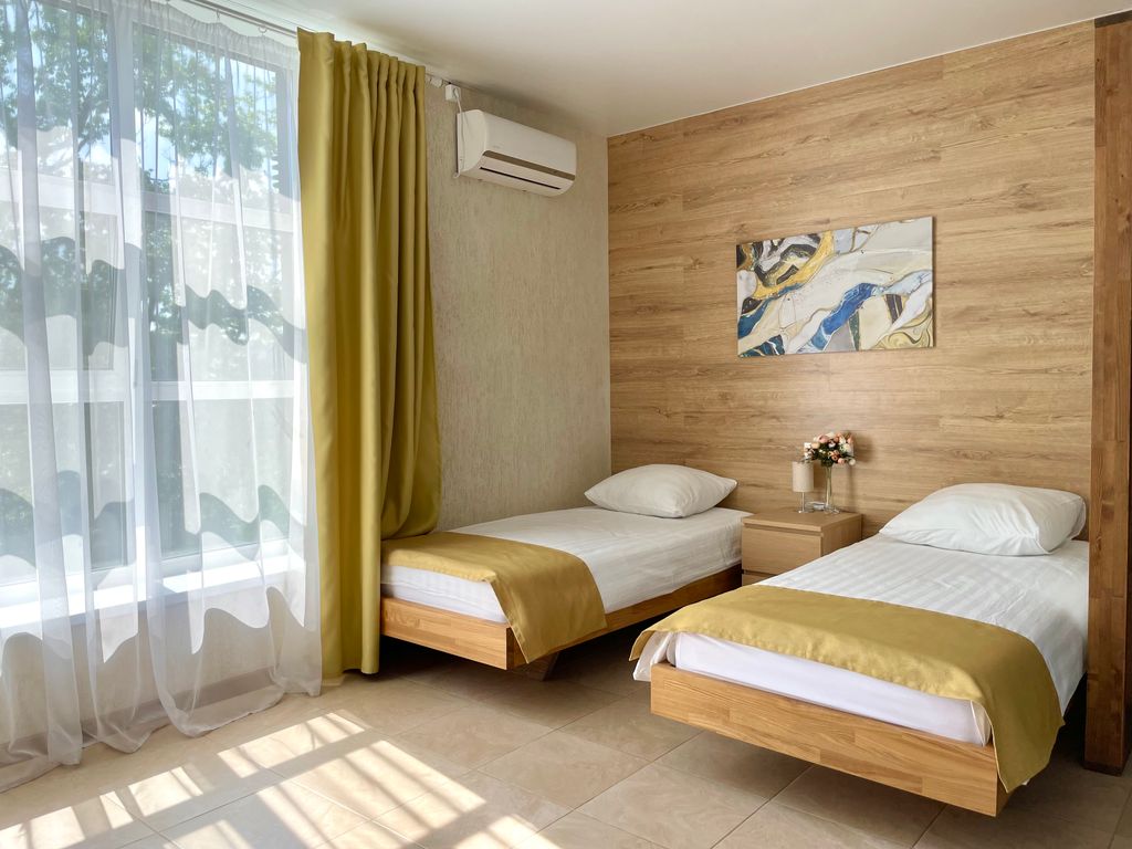 Главный — Двухместный номер с 2 отдельными кроватями Апартаменты-Студио с двумя односпальными кроватями