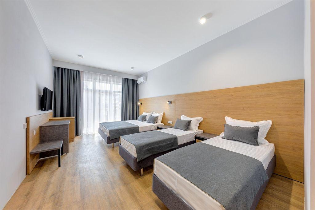 Anemos Resort Hotel — Четырёхместный номер люкс