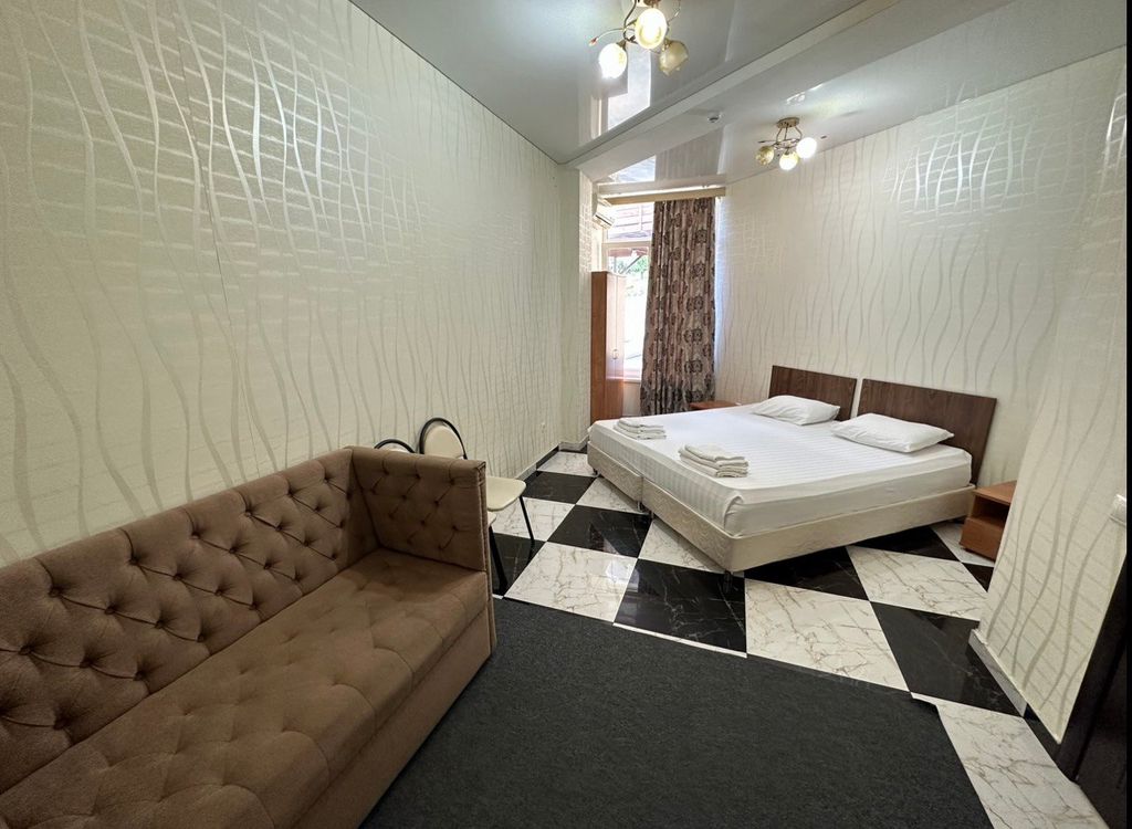 Куб — Двухместный номер с 1 кроватью с двуспальной кроватью