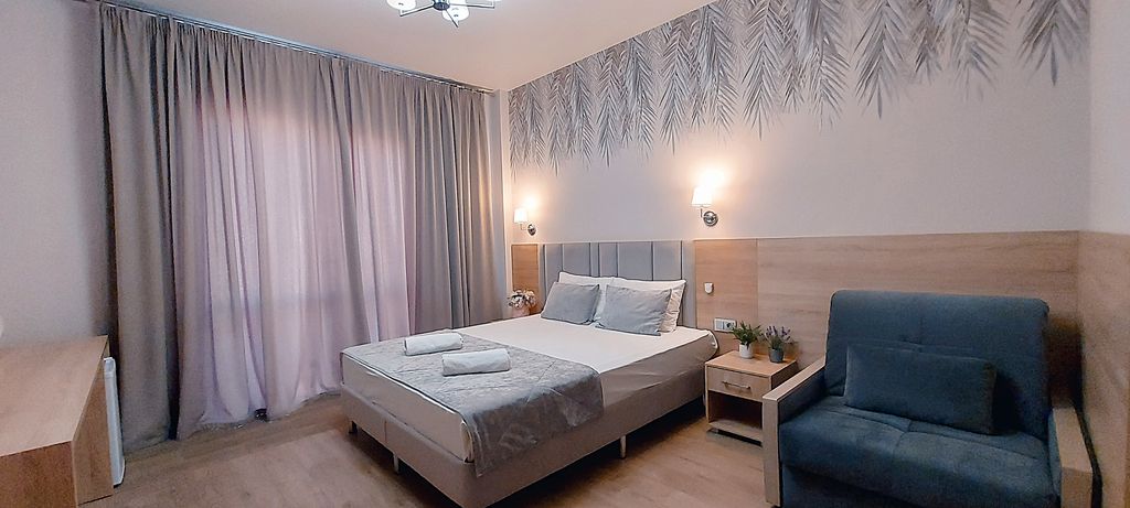 777 — Трёхместный номер Делюкс с балконом