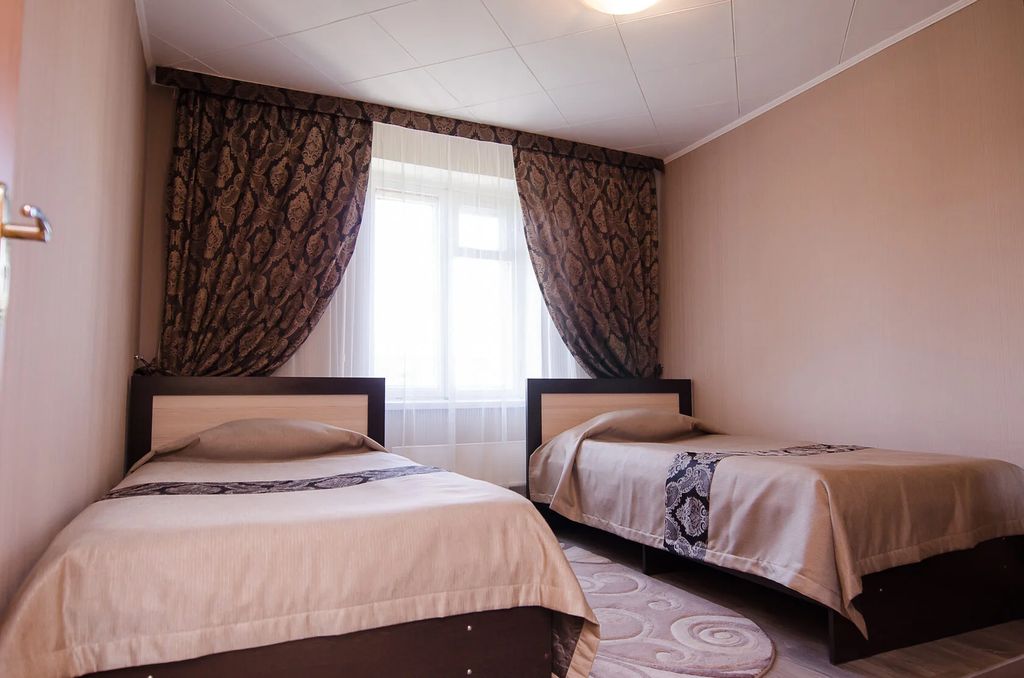 Уралочка — Двухместный номер с 2 отдельными кроватями улучшенный стандарт