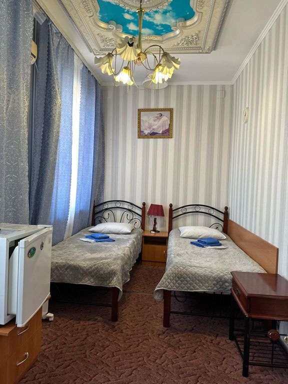 Lotos — Двухместный номер с 2 отдельными кроватями Макси улучшенный